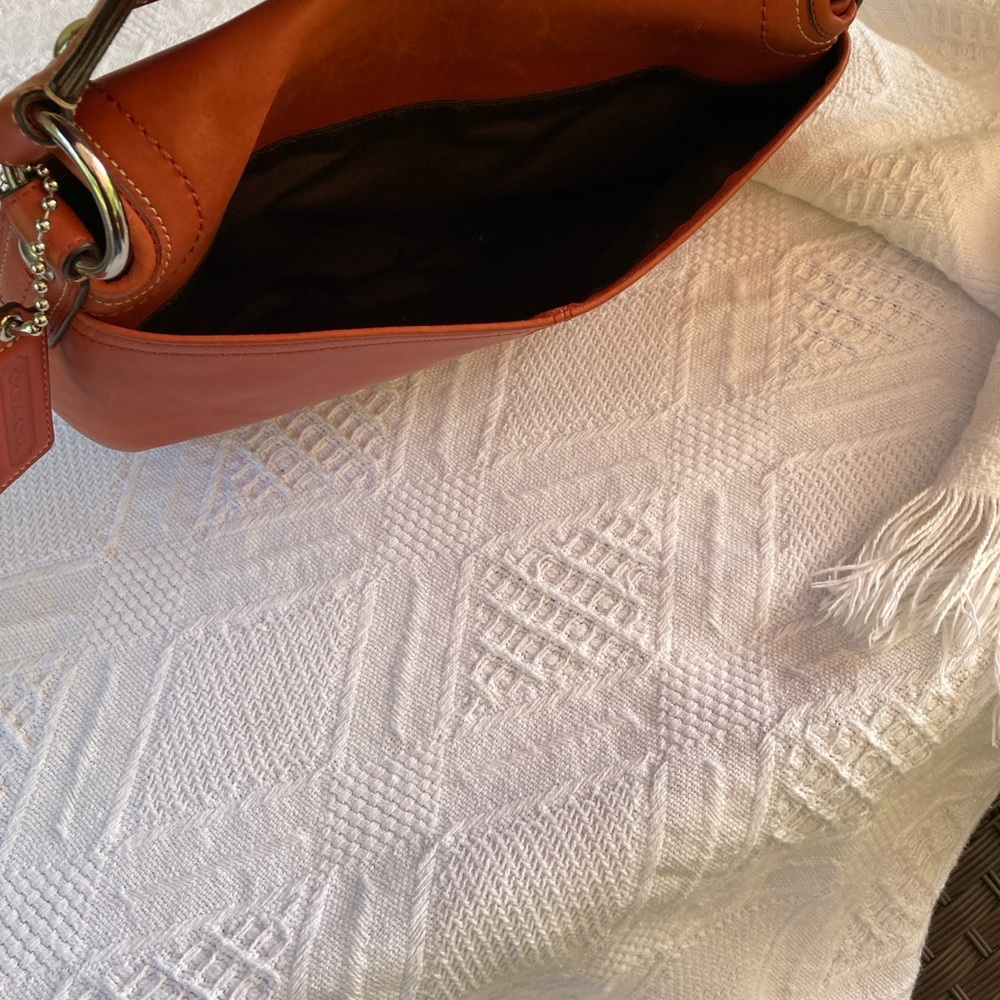 Coach SoHo, Burnt Orange Leather Shoulder Bag EUC, picture 8 shows a tiny dot - Picture 11 of 13